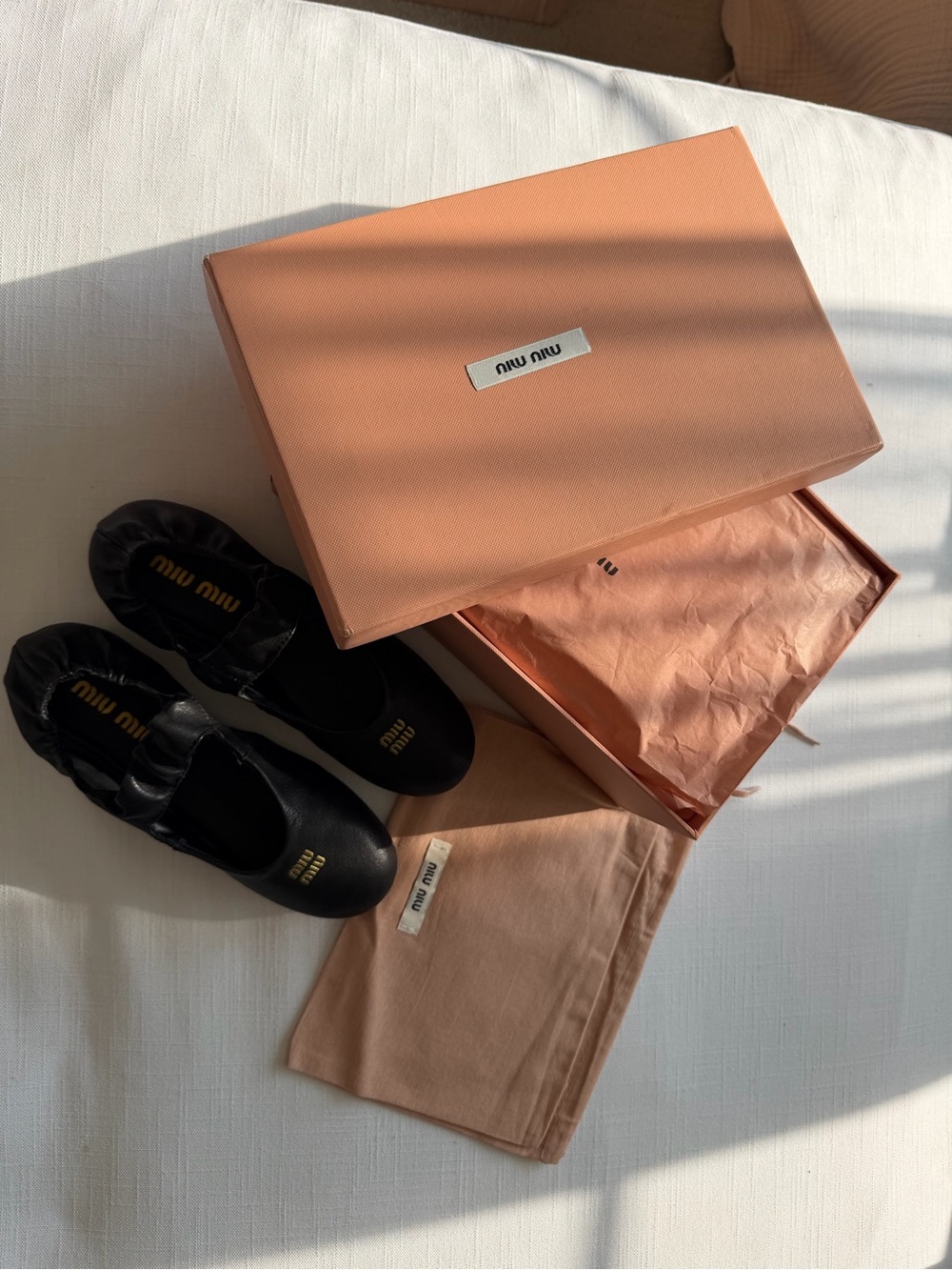 Miu Miu Black Leather Ballet Flats with Gold Logo